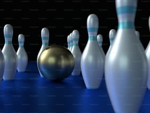 un groupe d’épingles de bowling et une boule de bowling