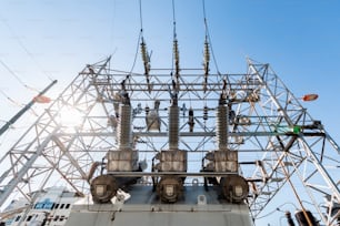 a large electrical tower with lots of wires