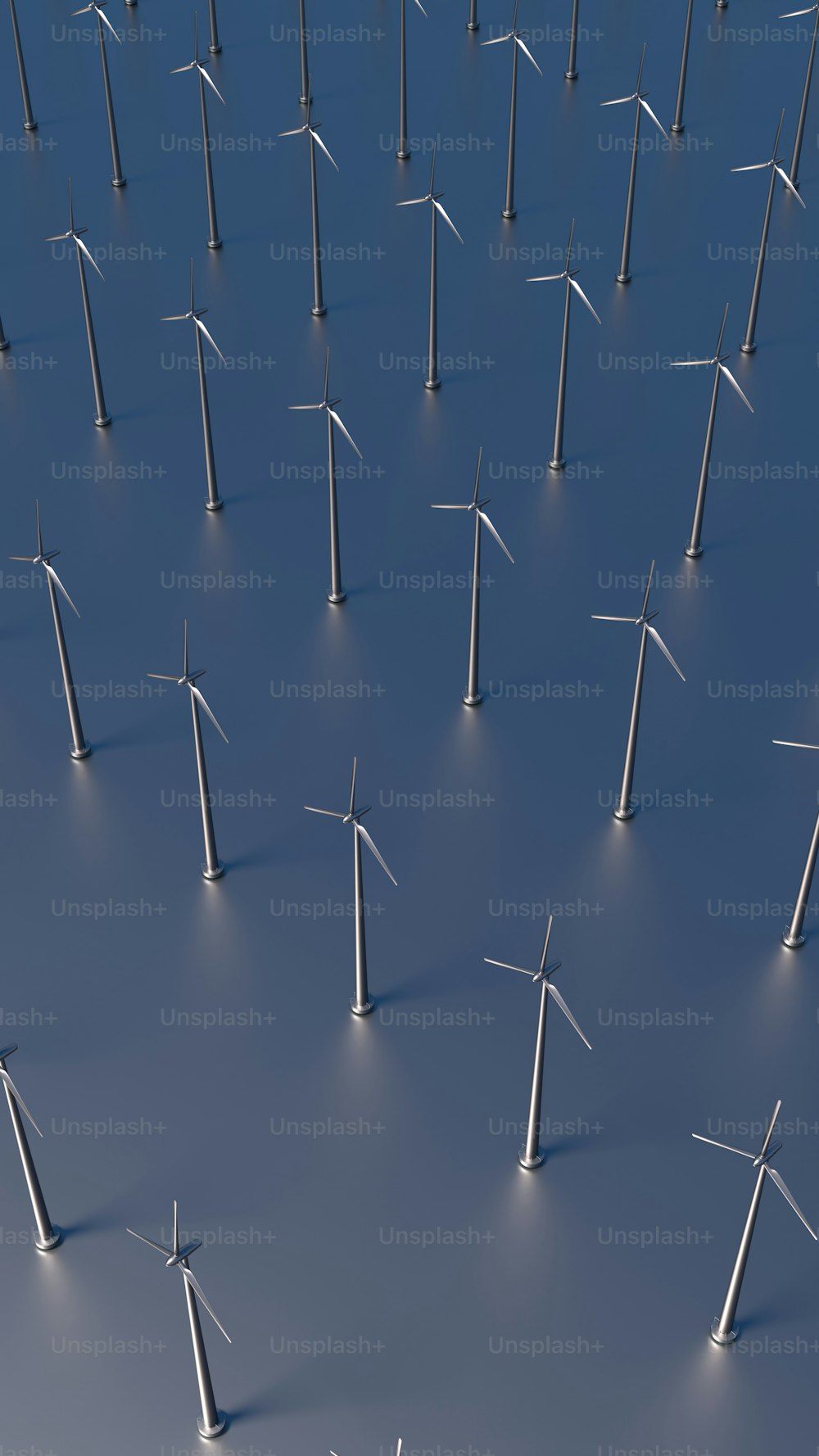 a large group of windmills in the middle of a field