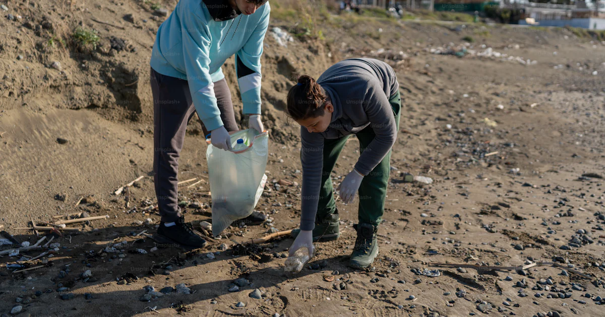 A couple of people that are standing in the dirt photo – Volunteering ...
