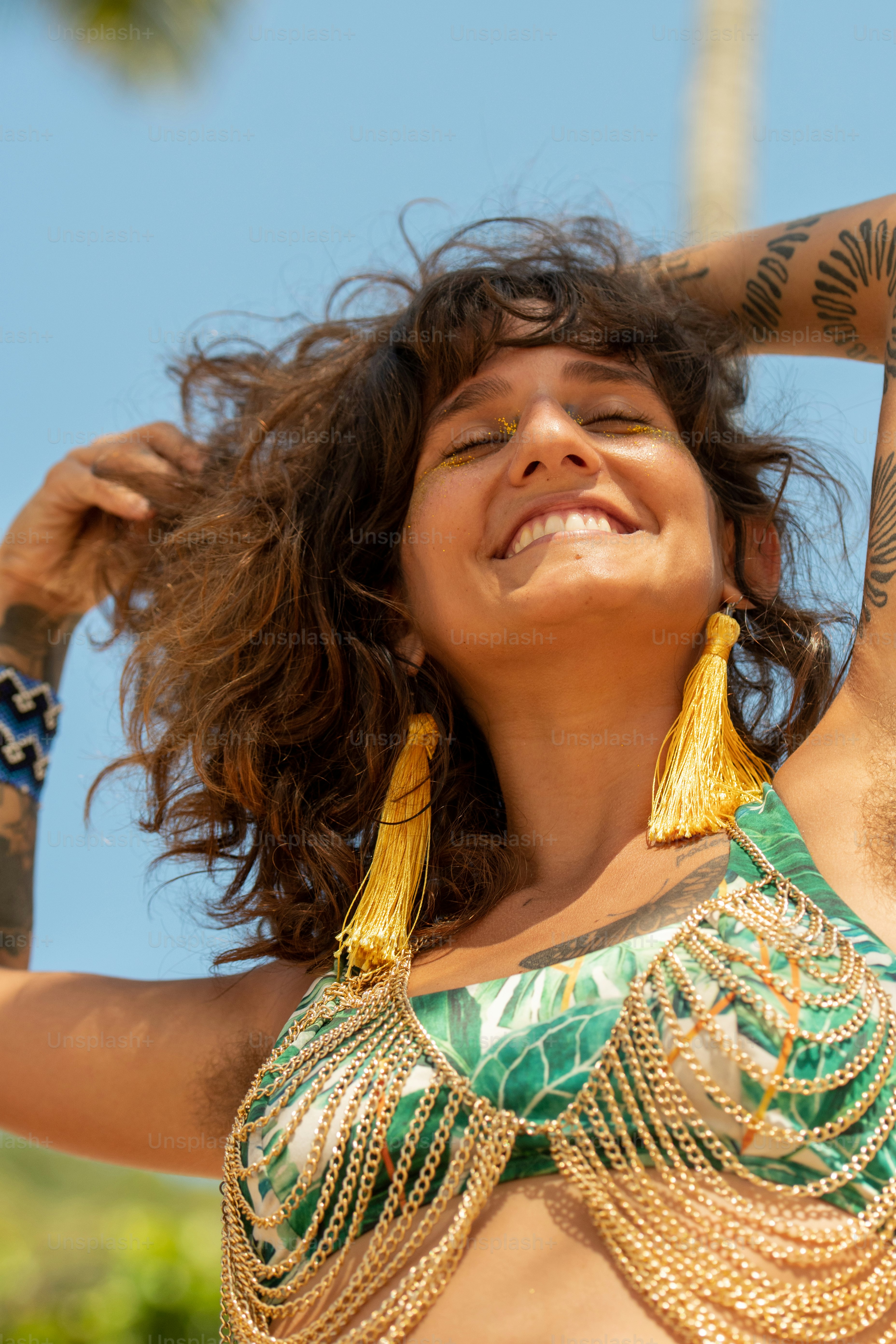 a woman in a green and gold costume