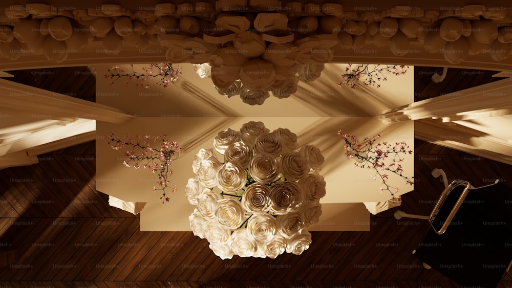 uma vista aérea de um vaso de flores em uma mesa