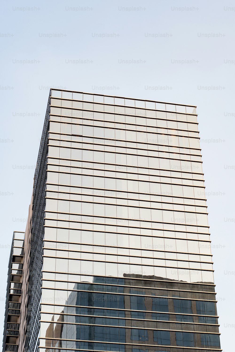 a very tall building with a clock on it's side