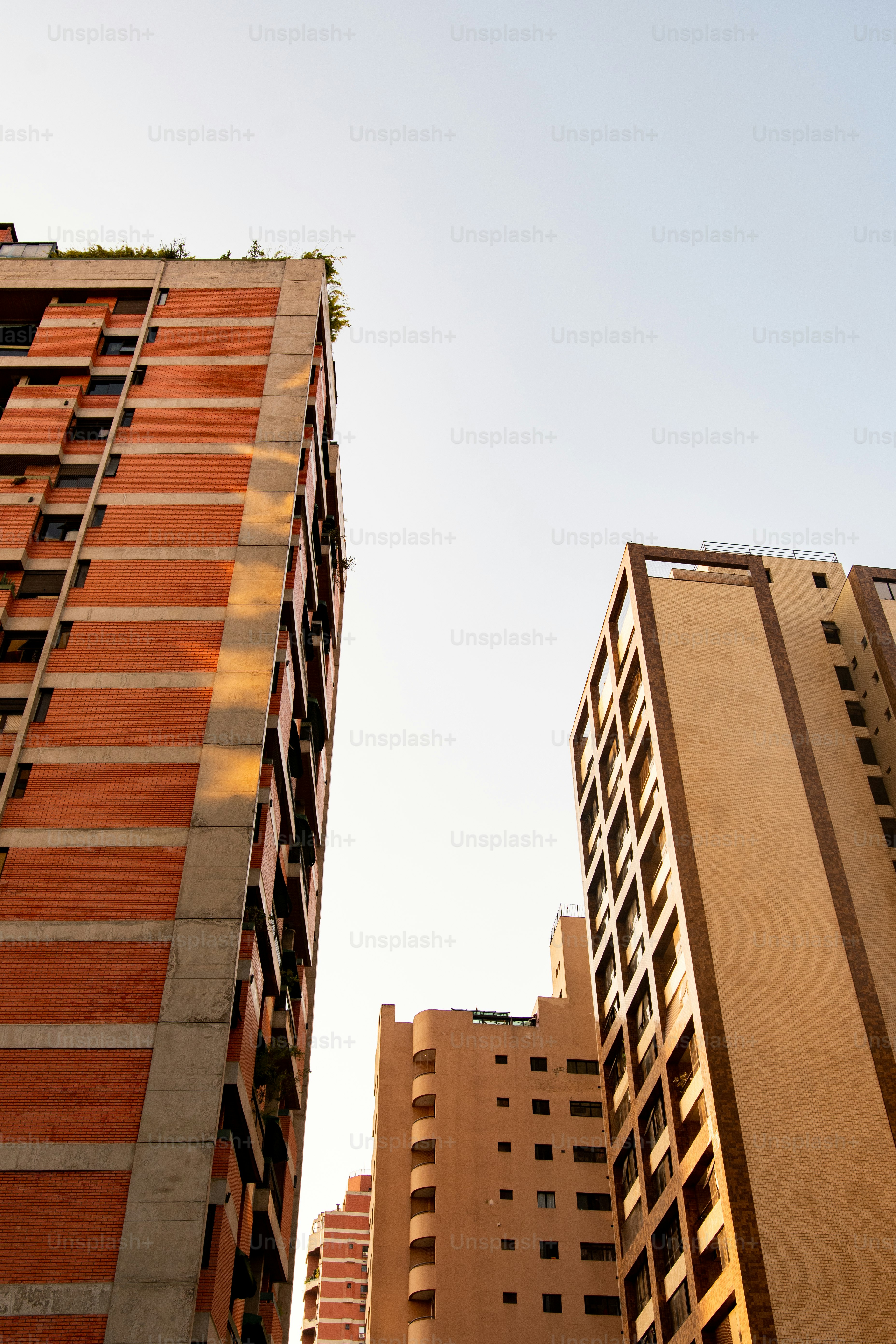 a couple of tall buildings next to each other