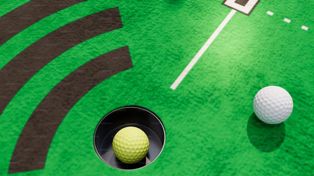 a golf ball and a tee on a green surface