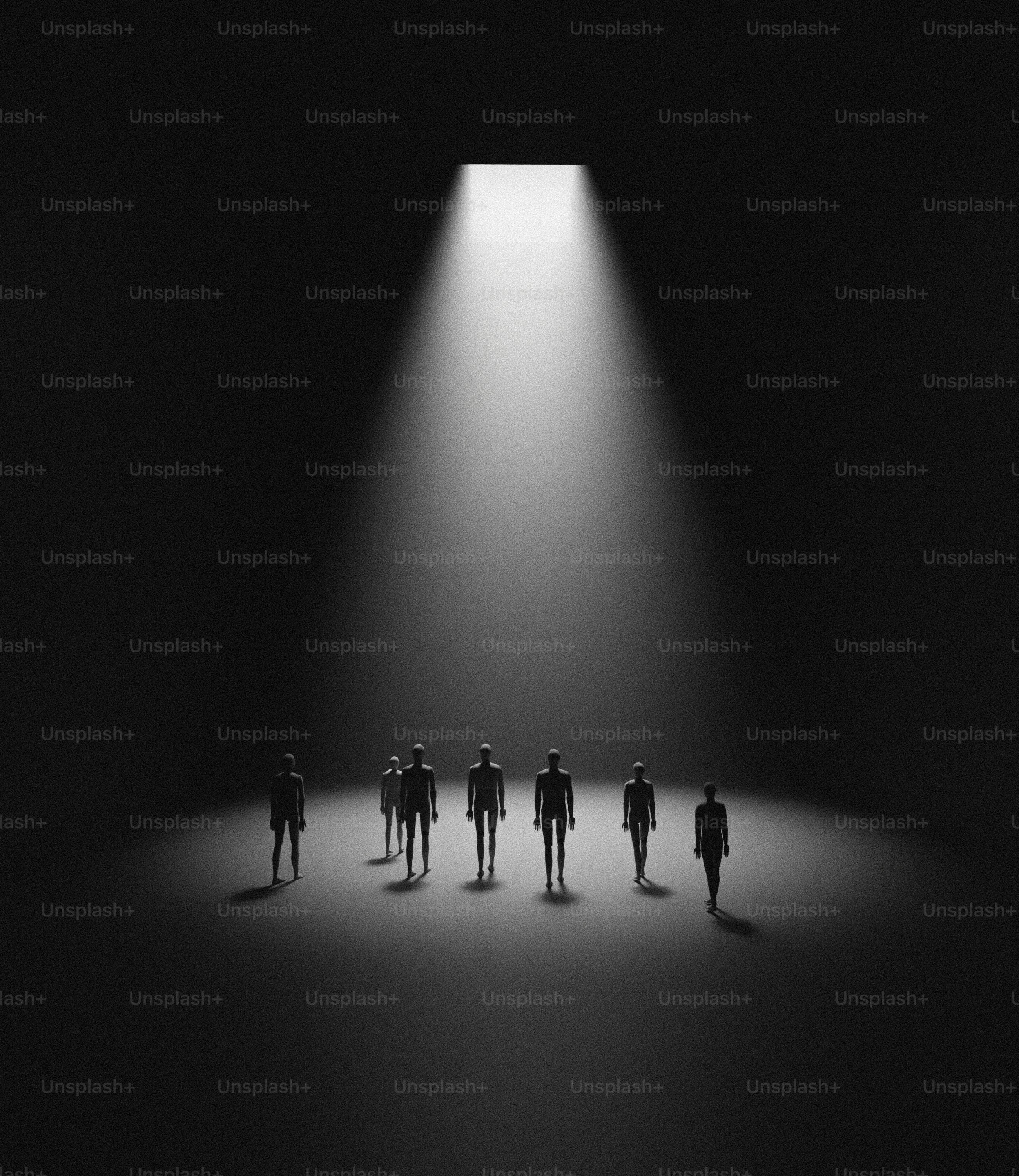A group of people standing in front of a light photo Crowd Image on