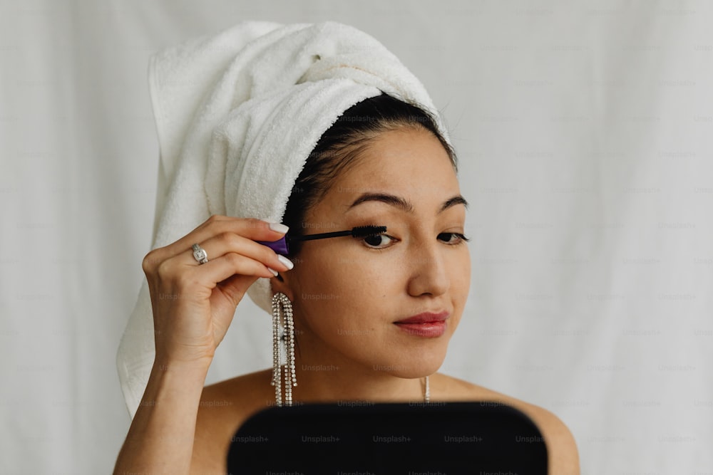 a woman with a towel on her head
