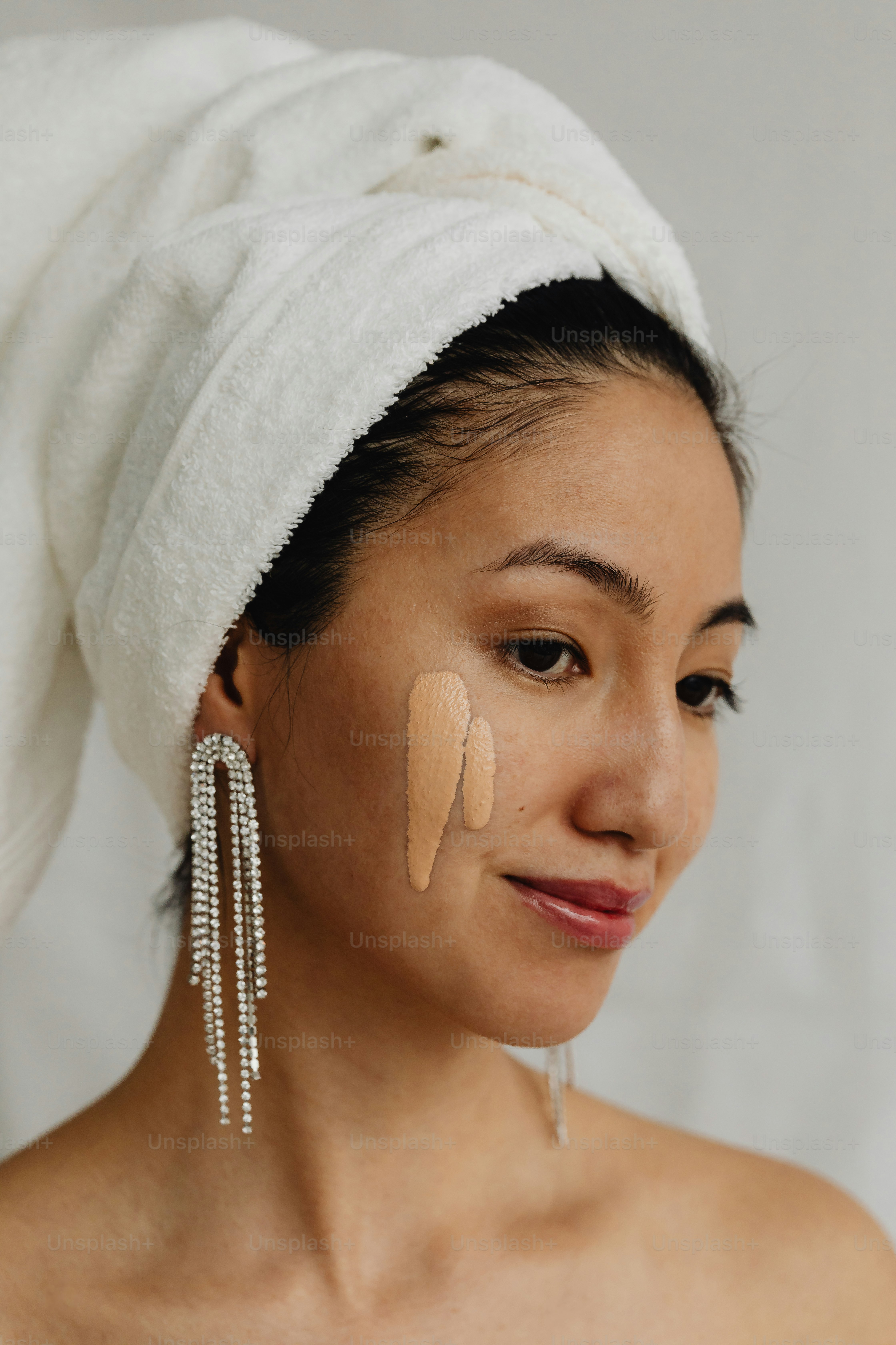 a woman with a towel on her head