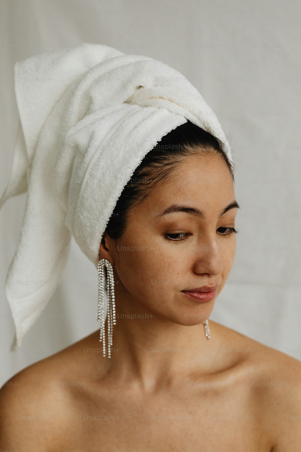 a woman with a towel on her head