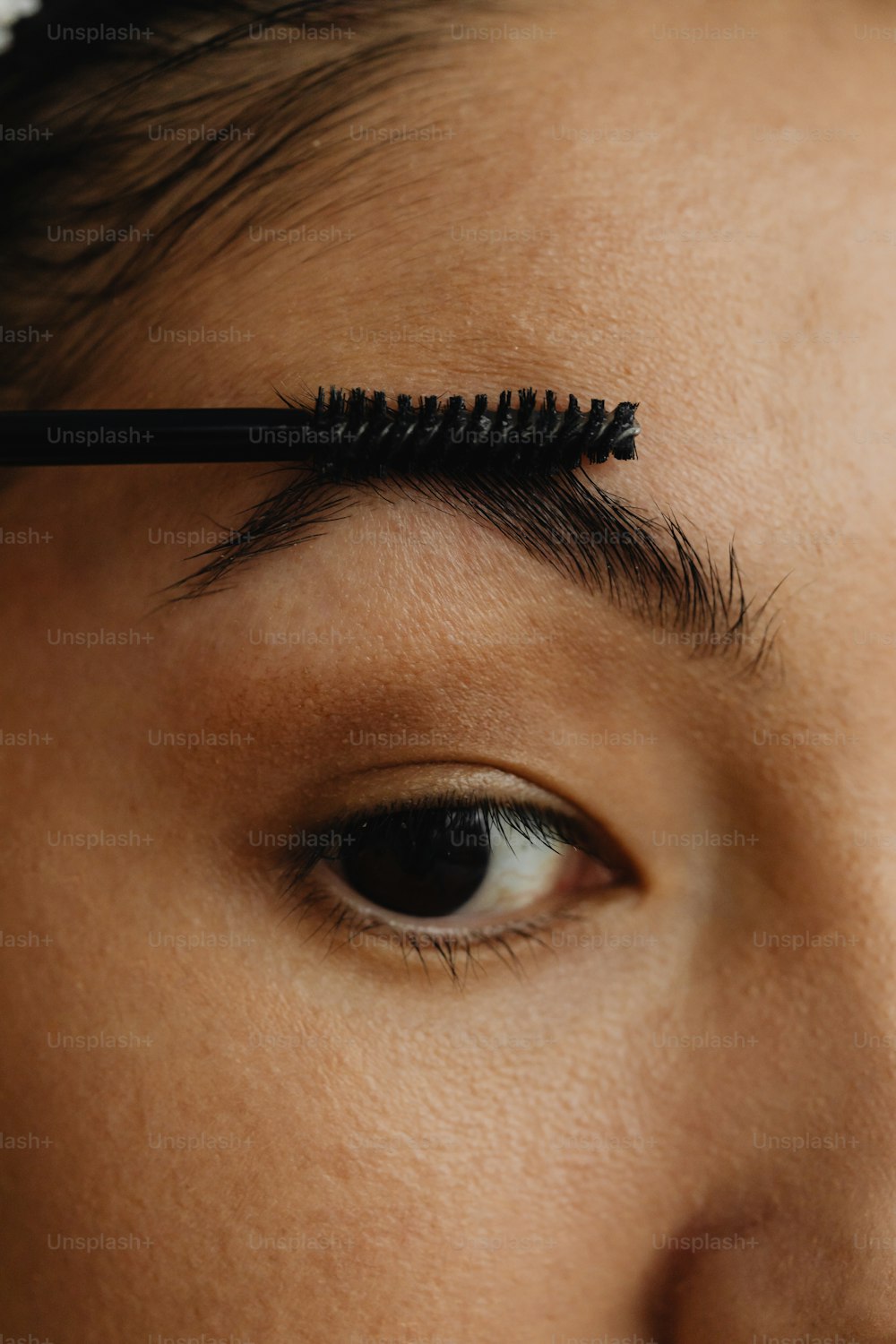 a close up of a person with a mascara