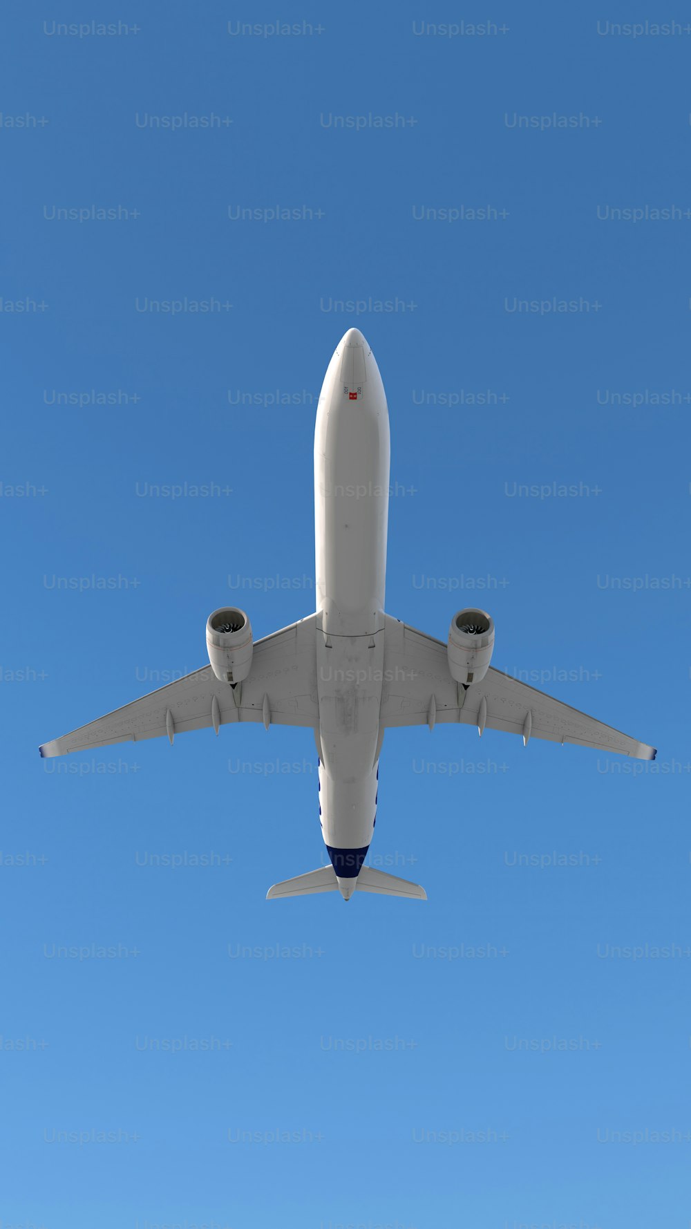 a large jetliner flying through a blue sky