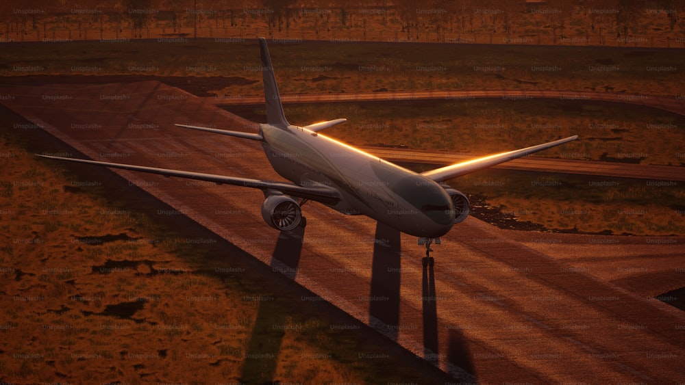 un grande aereo di linea seduto in cima a una pista dell'aeroporto