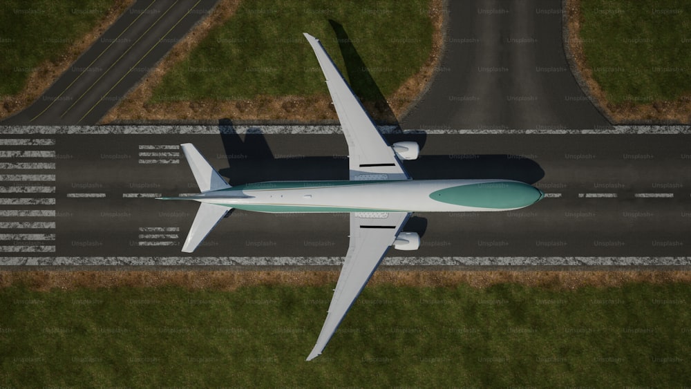 a large jetliner flying over a lush green field