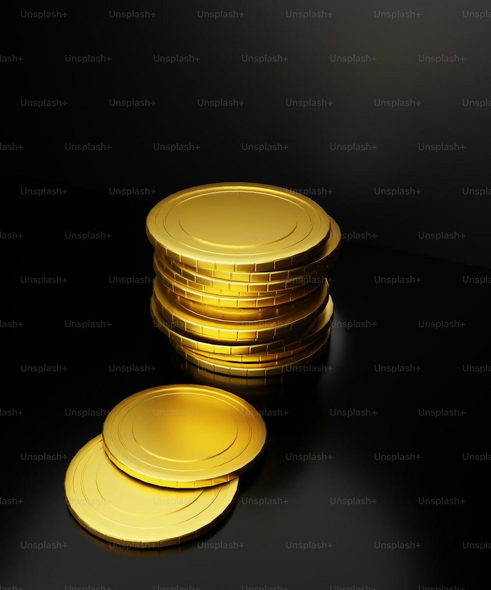 a stack of gold plates sitting on top of a table