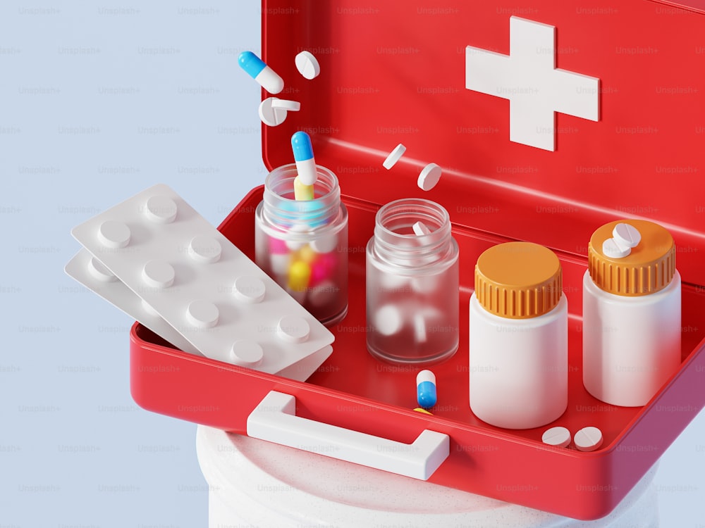 um kit médico com pílulas, pílulas e outros suprimentos médicos