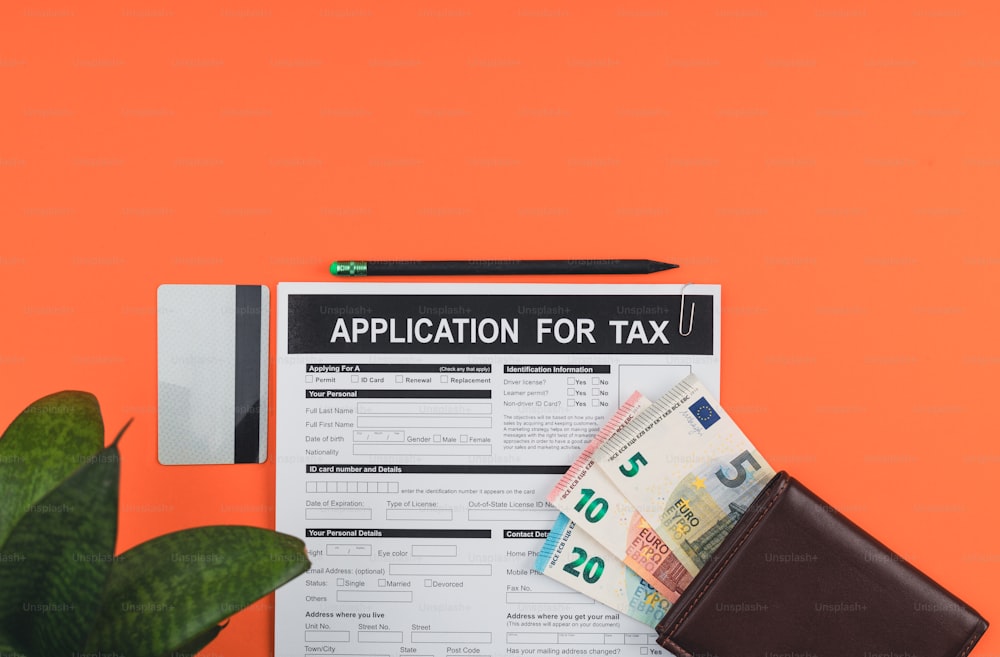 an application for tax with a wallet and money
