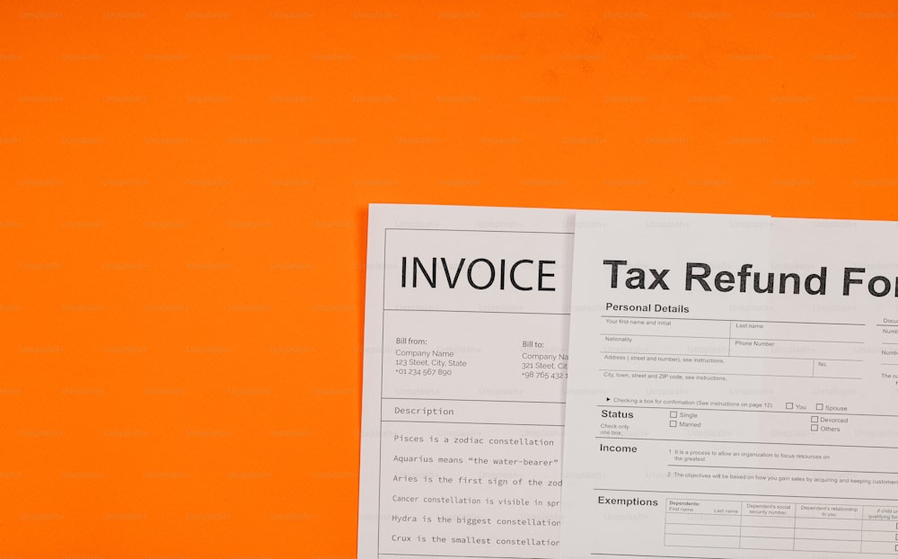 a pair of tax refund forms on an orange background