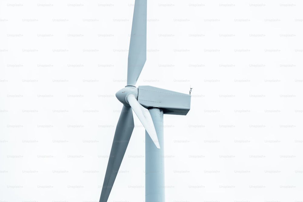 a close up of a wind turbine on a white background