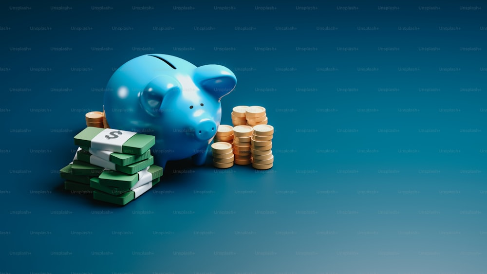 a blue piggy bank sitting next to stacks of coins