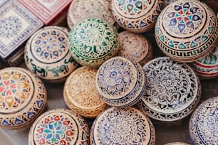 a close up of a bunch of different colored bowls