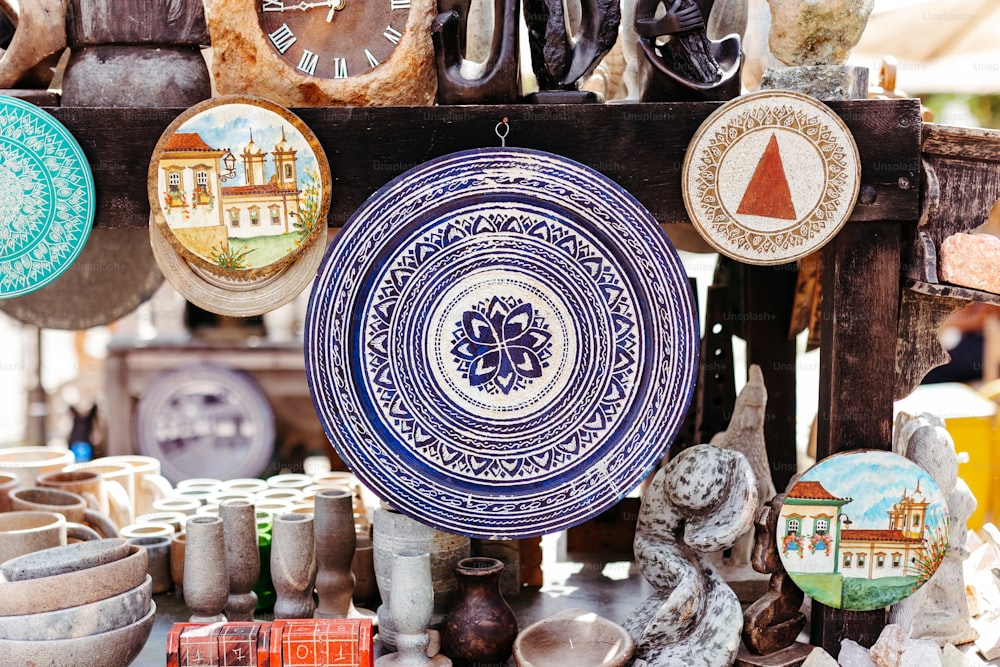 a table topped with lots of plates and bowls