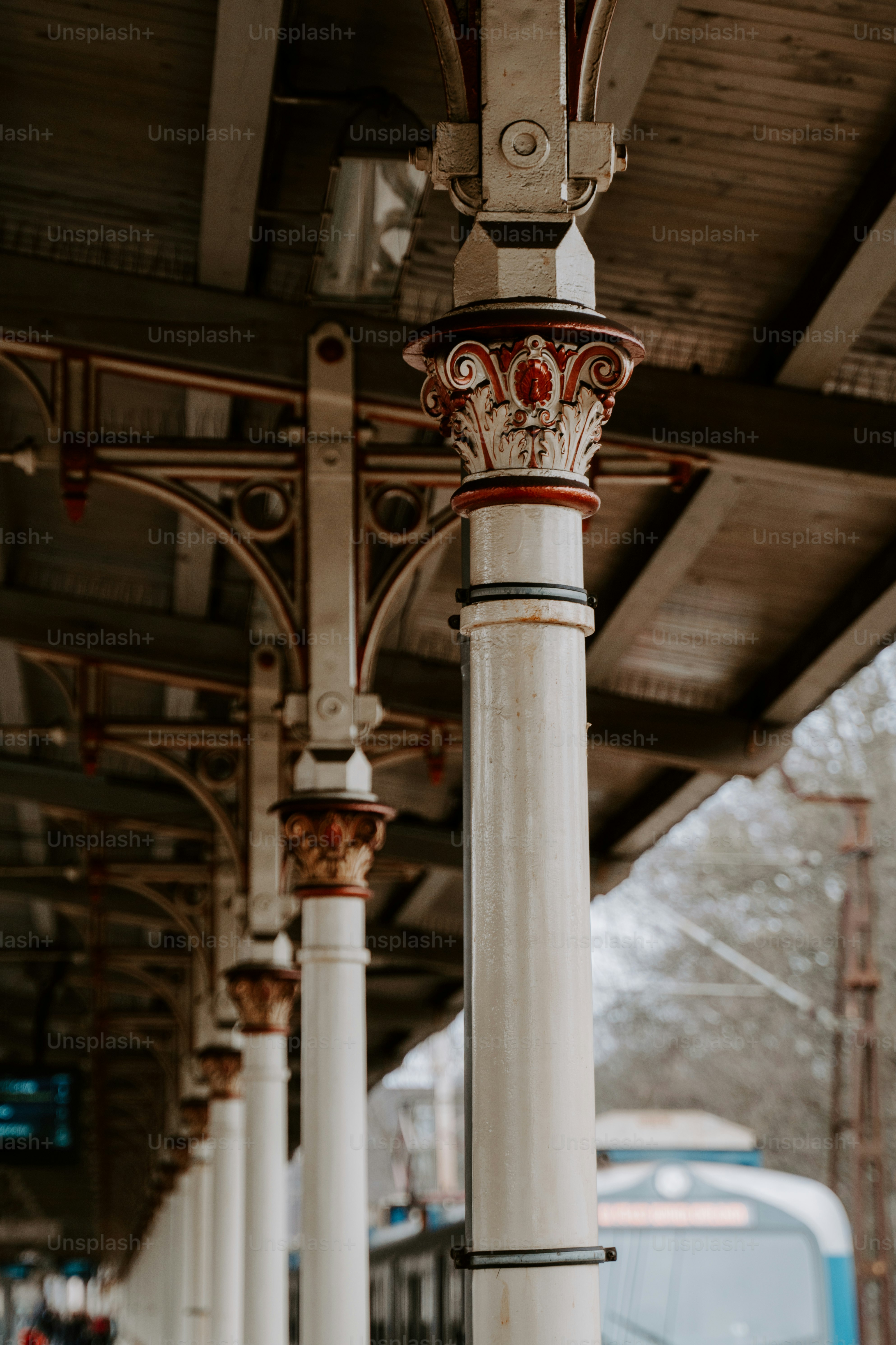 a train on a train track next to a building