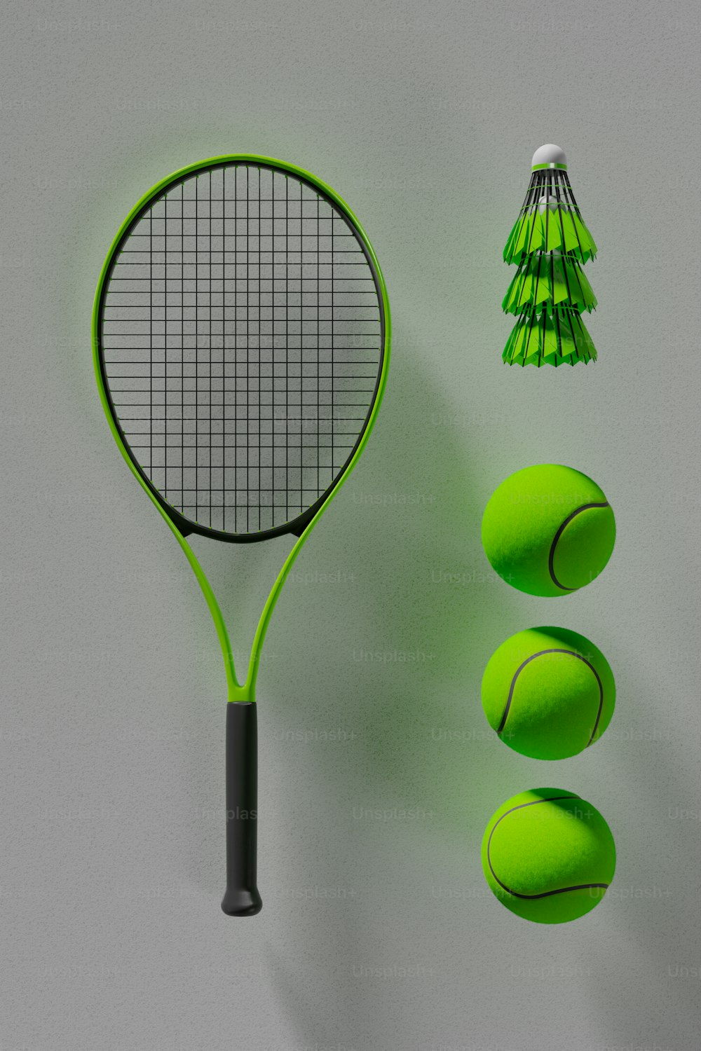a green tennis racket and three green balls