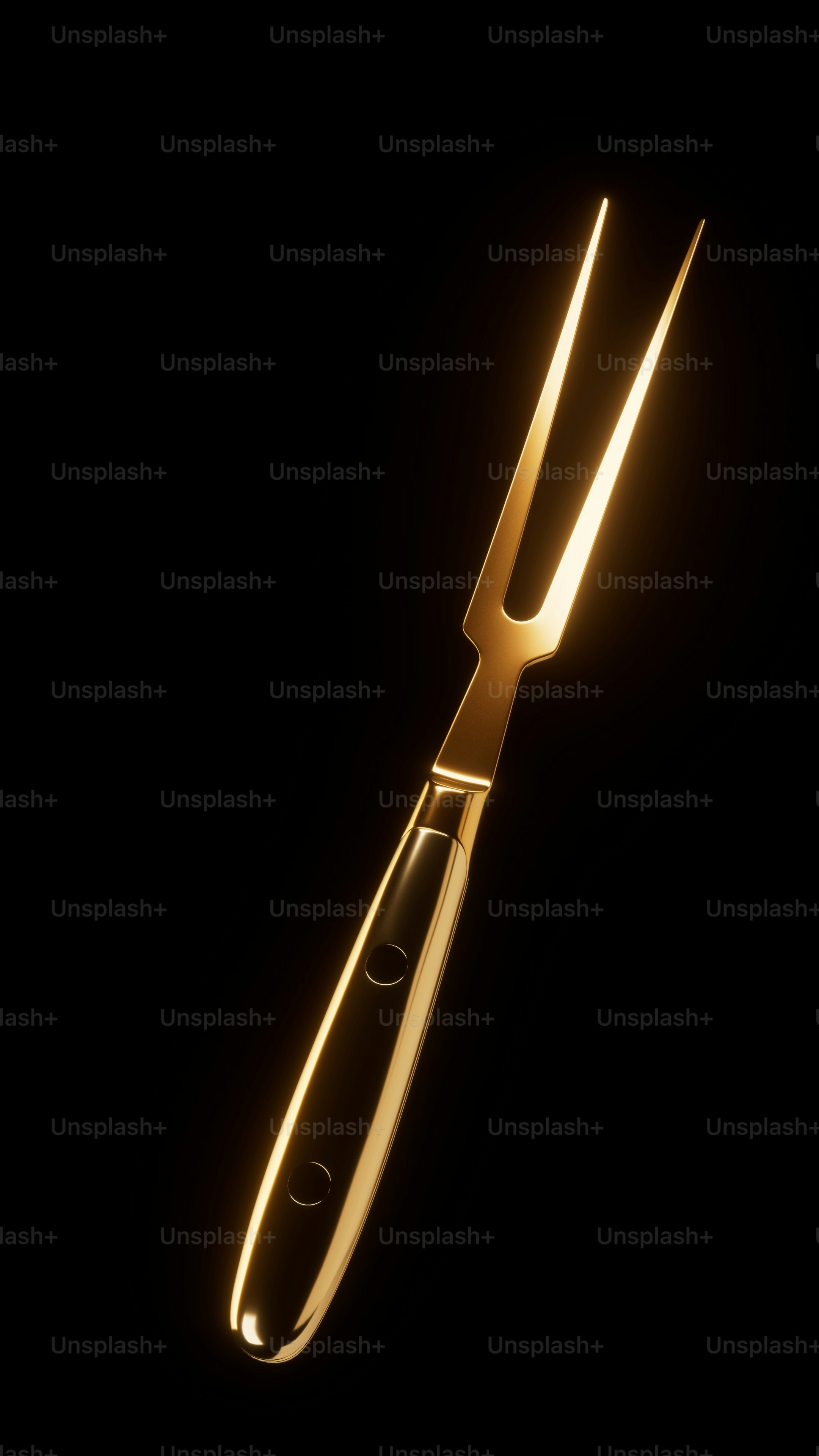 A pair of gold scissors with a black background photo Fork Image on