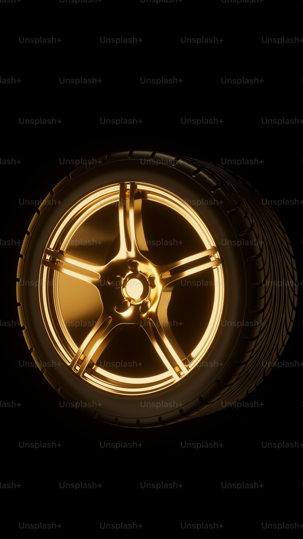 a car tire with a glowing wheel on a black background