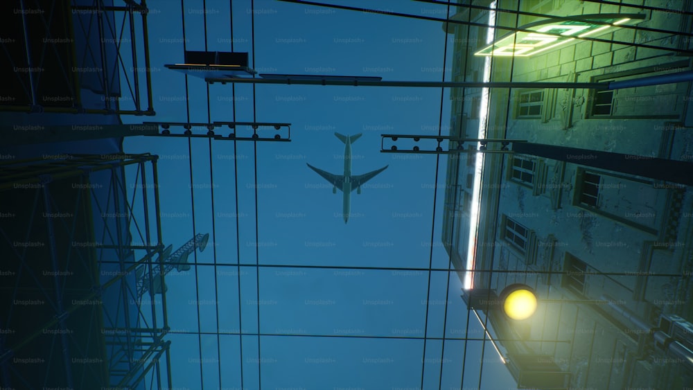 an airplane is flying over a city at night