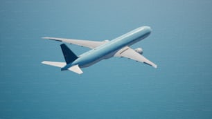 a blue and white airplane flying in the sky