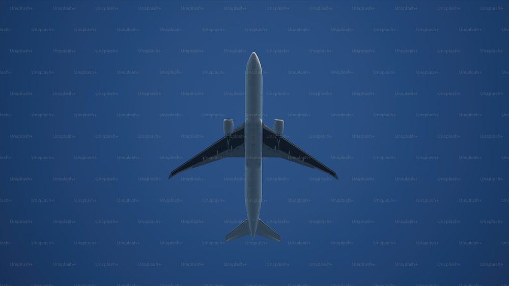 a large jetliner flying through a blue sky