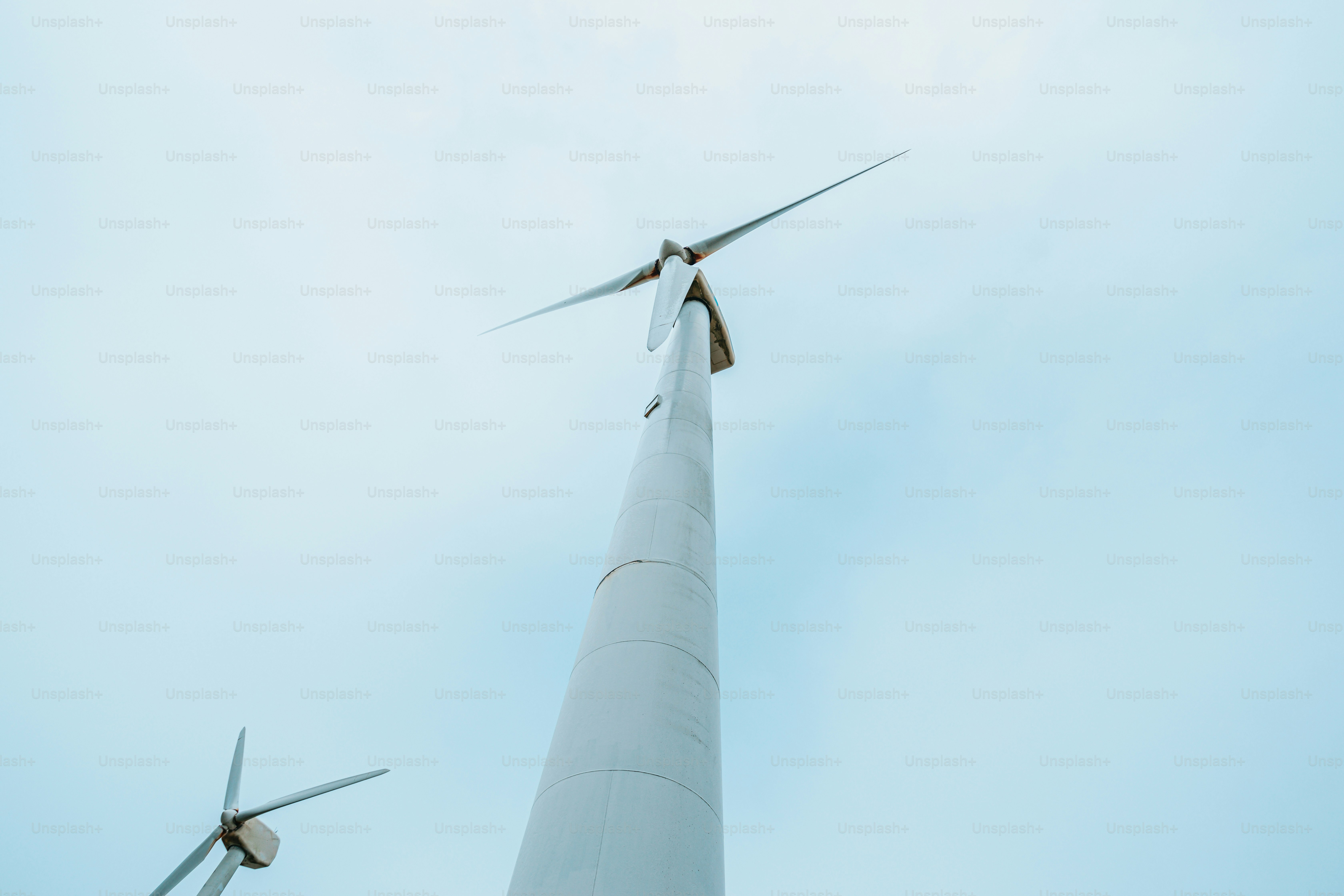 a group of windmills that are next to each other