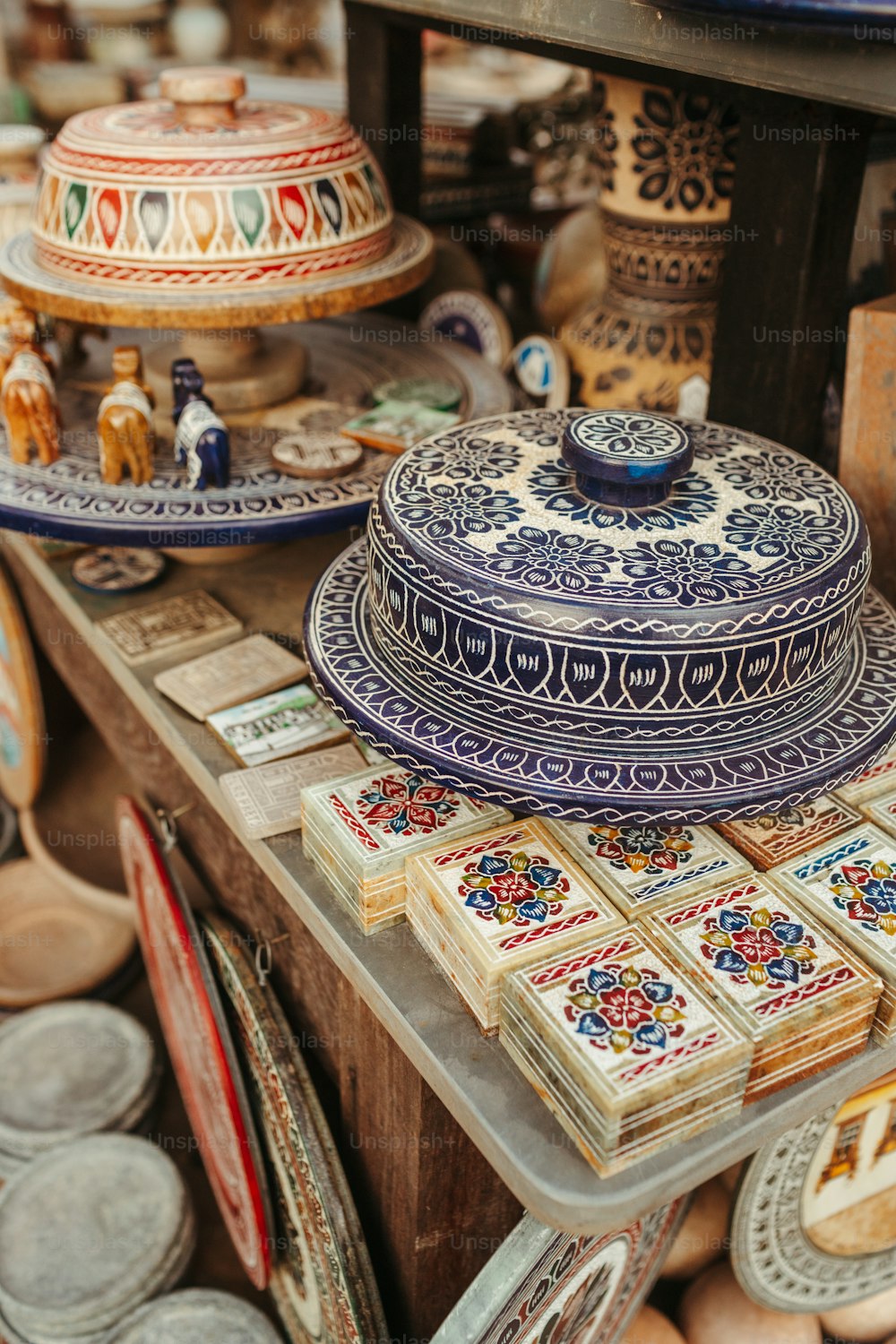 a table topped with lots of plates and bowls
