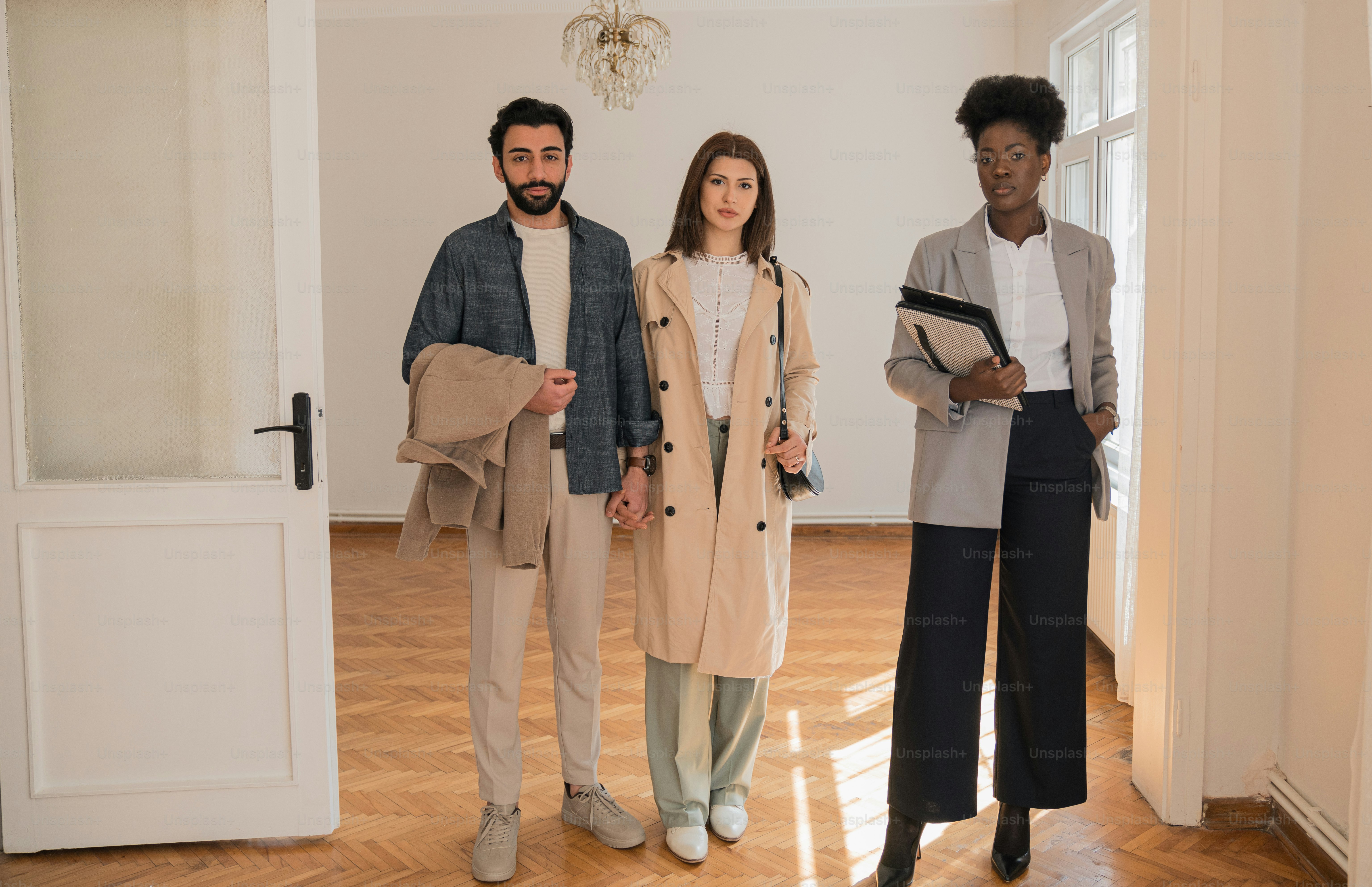 a group of people standing in a room