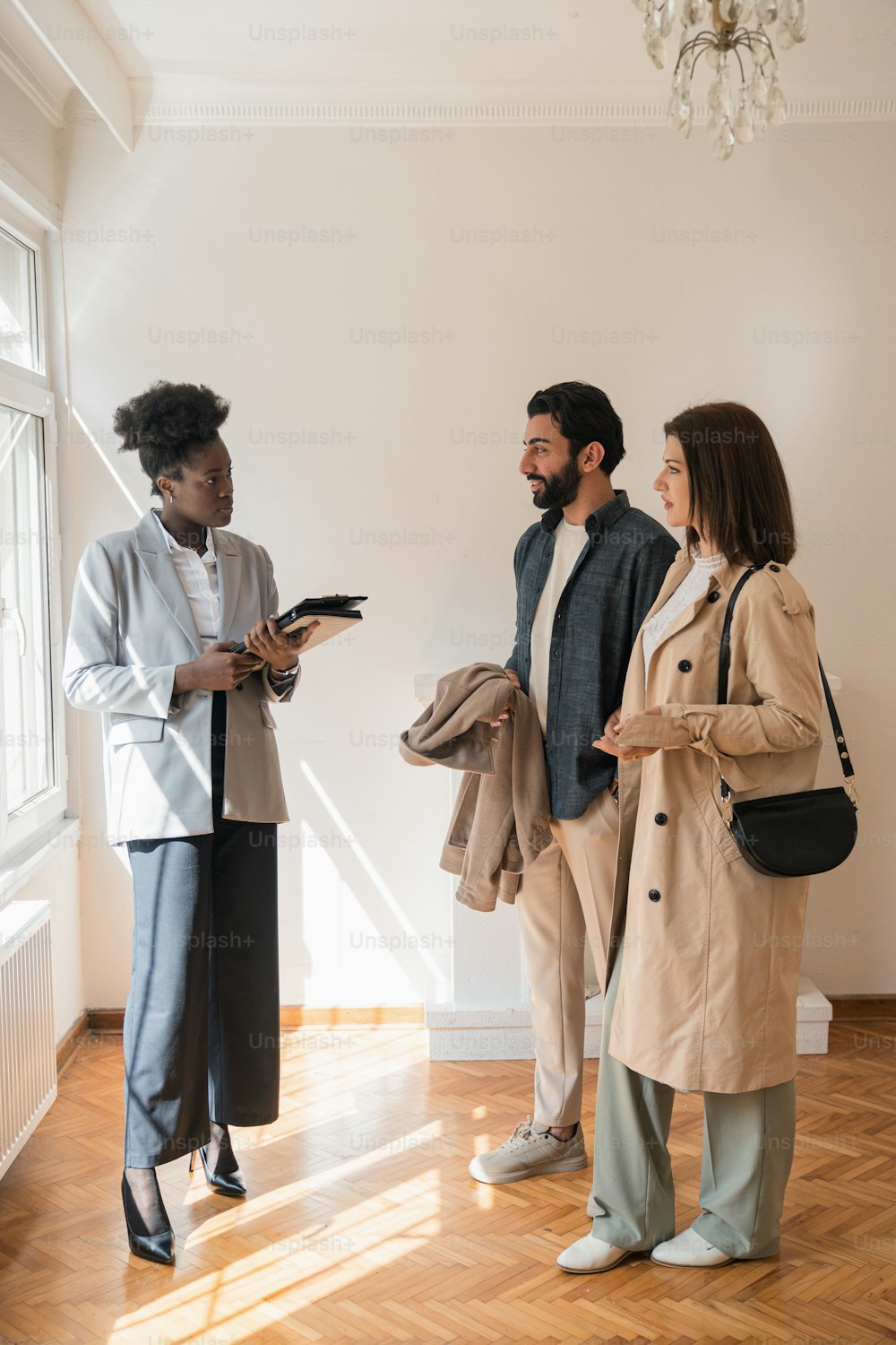 a group of people standing in a room