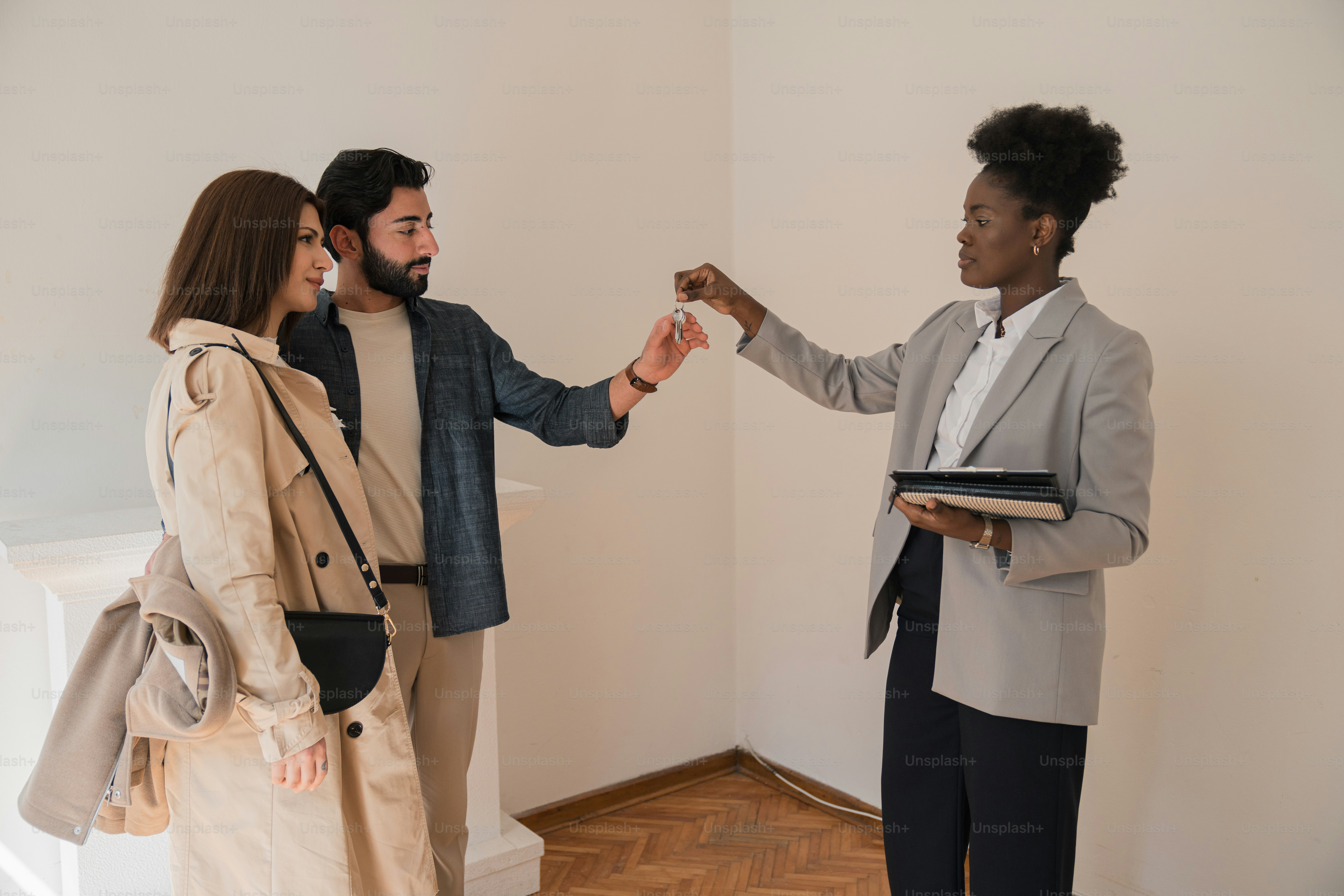 a man and a woman standing in a room