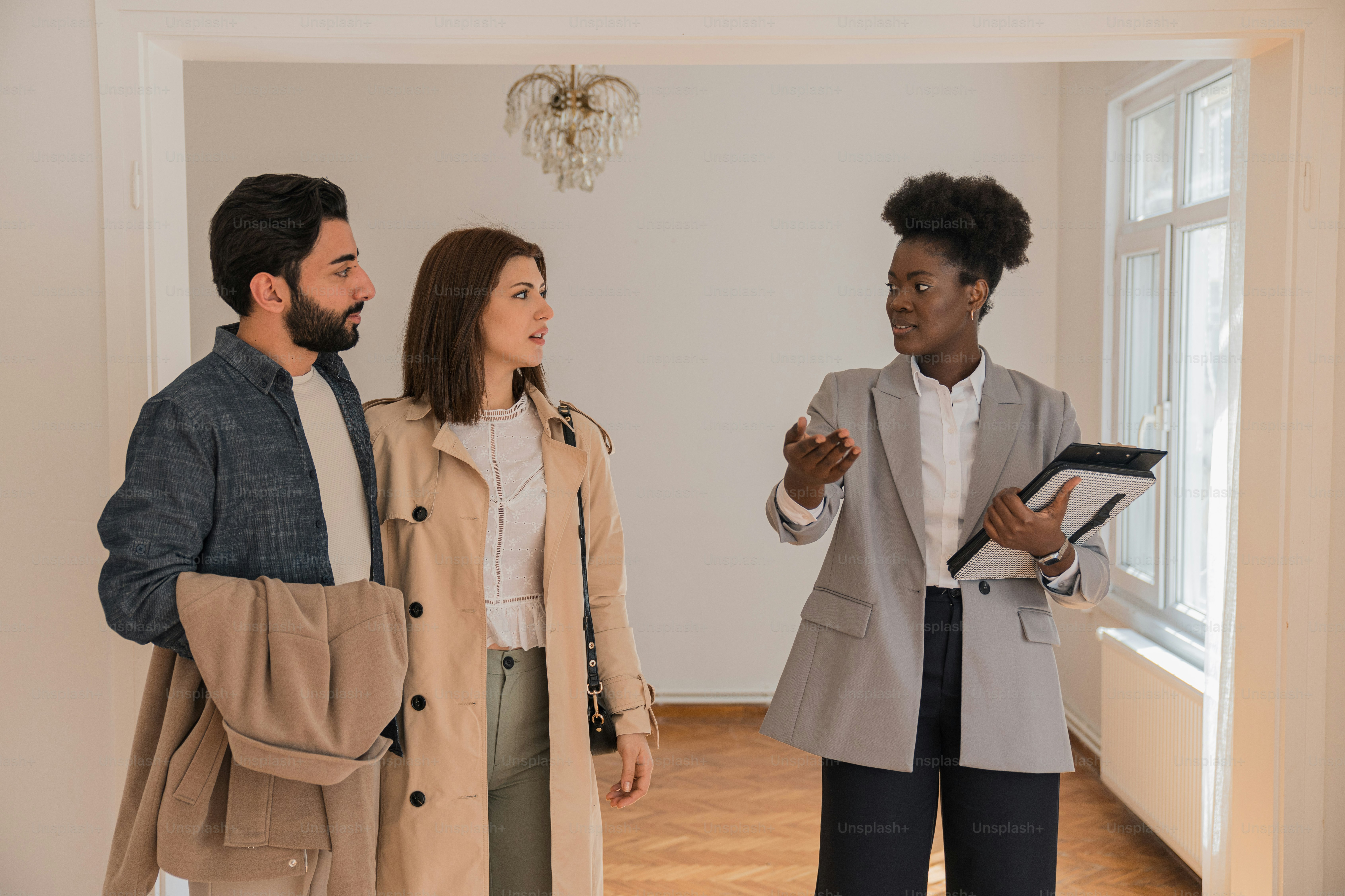 a group of people standing in a room