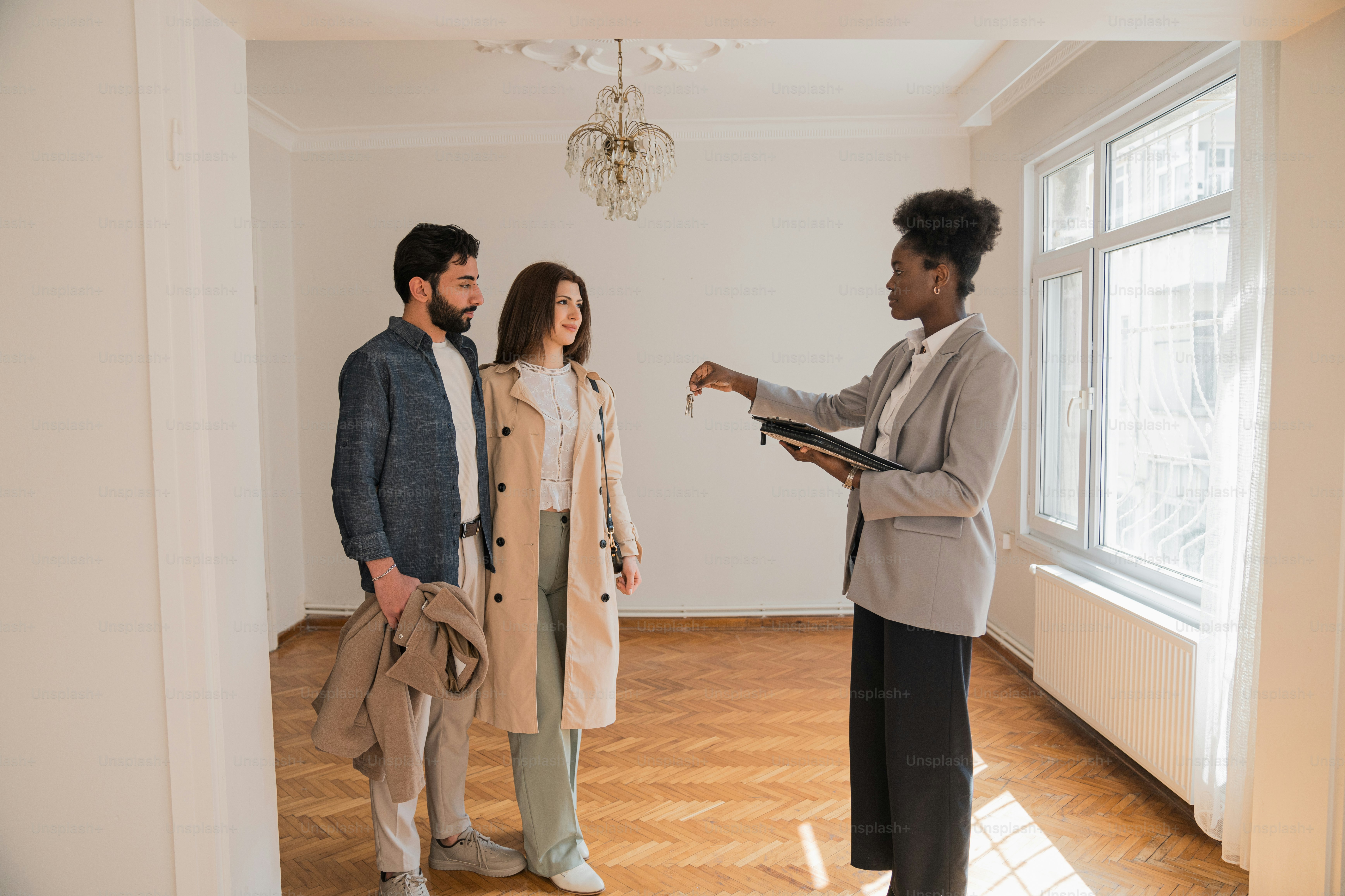 a group of people standing in a room