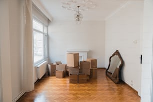 a room filled with boxes and a mirror