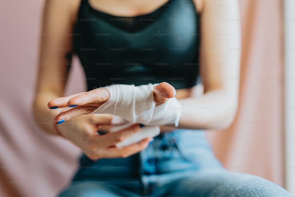 a woman with a cast on her arm