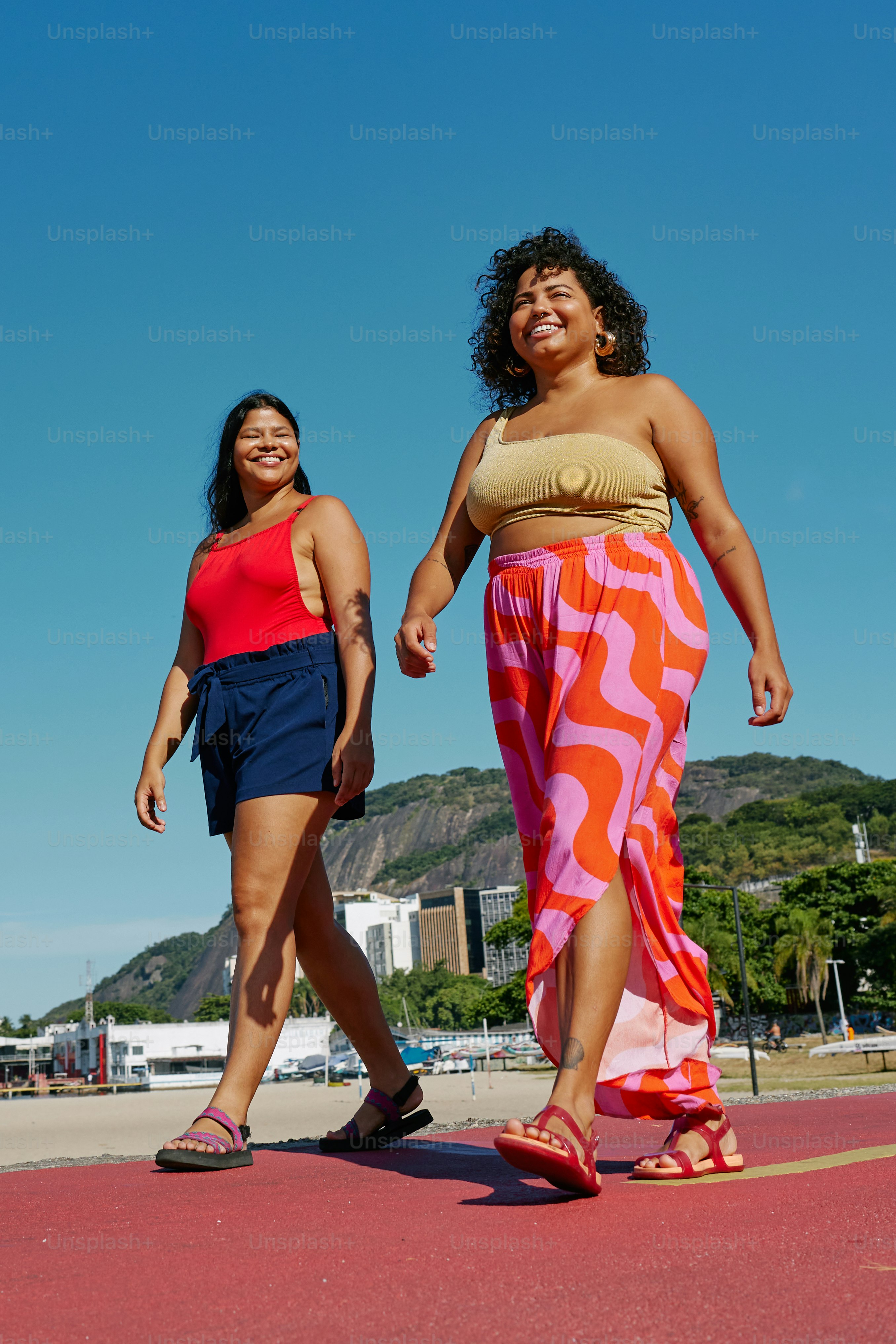a couple of women standing next to each other