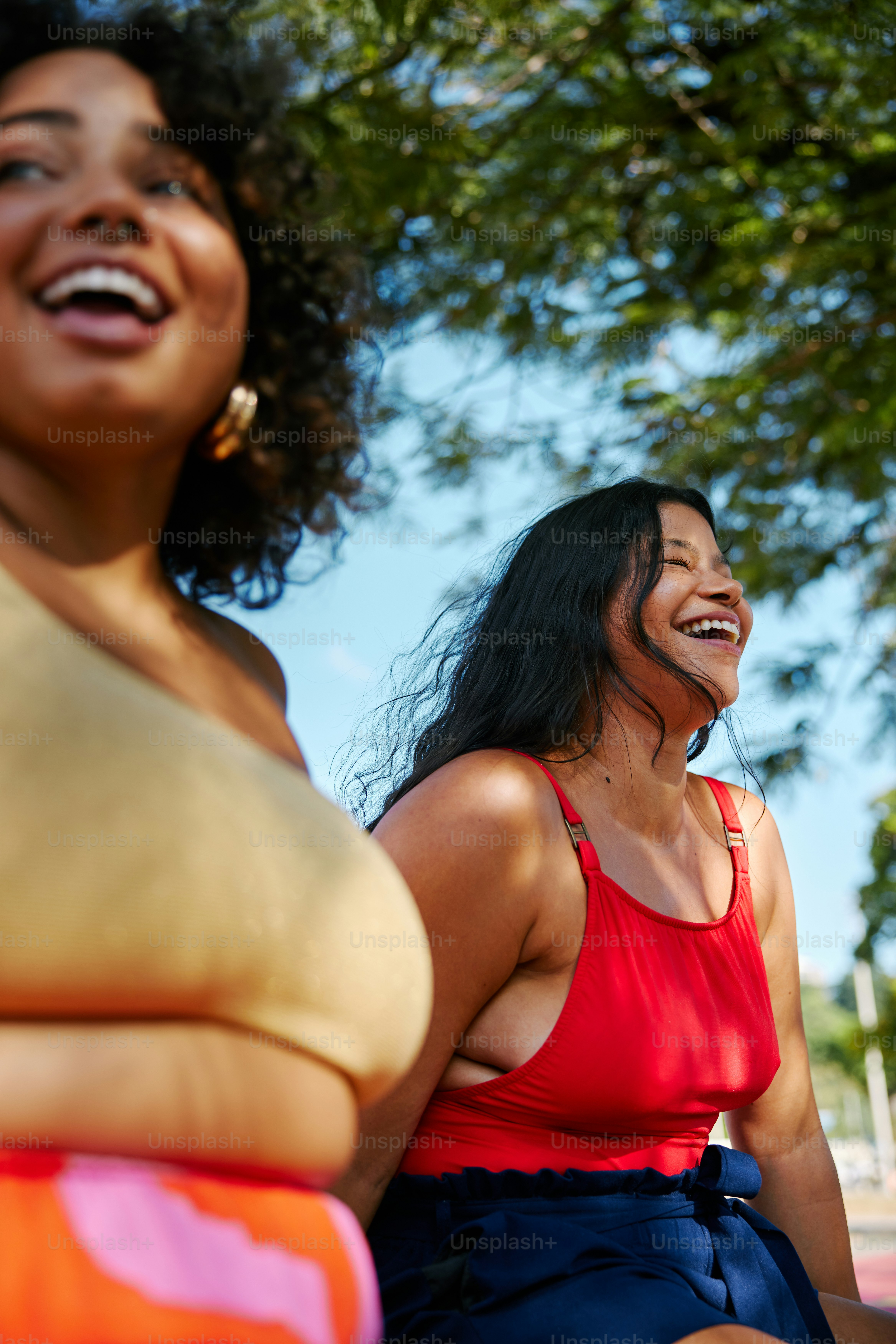 a group of women sitting next to each other