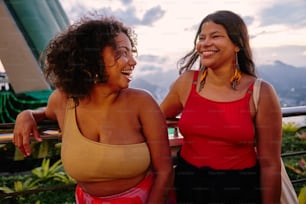 a couple of women standing next to each other