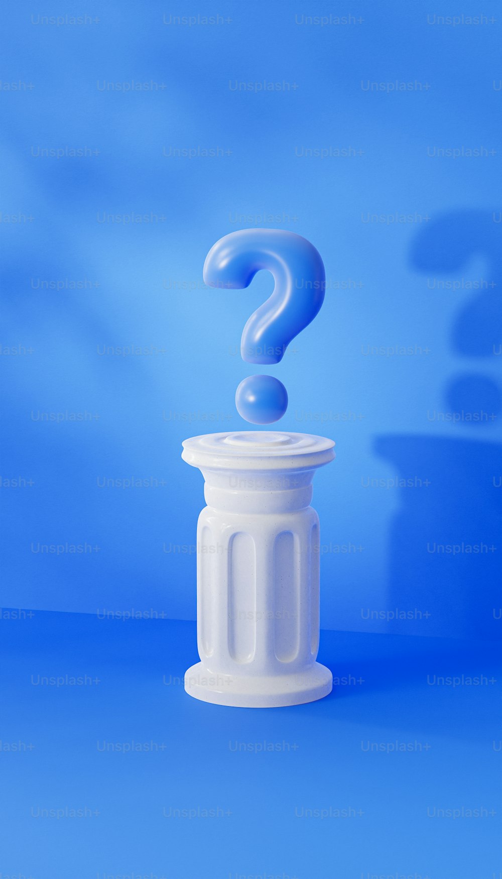 a question mark on top of a white container