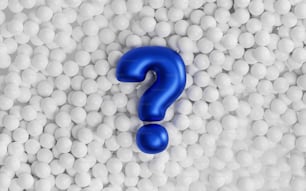 a blue question mark surrounded by white balls