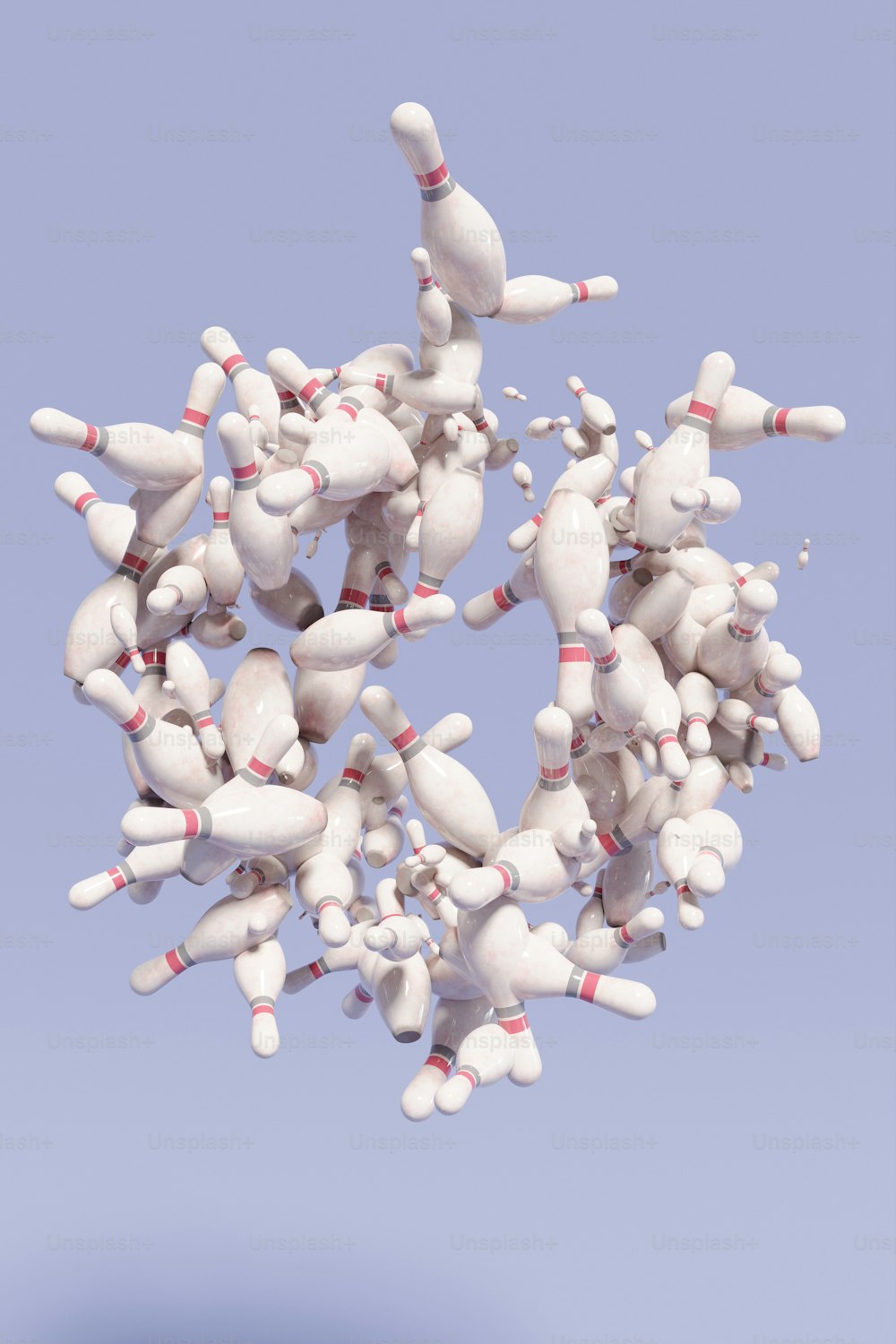 a bunch of bowling pins flying through the air
