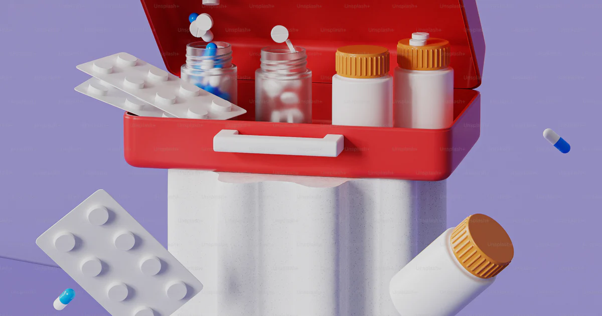 Pill Kit A pillbox with pills, pills, and pills in it photo – First aid kit ...