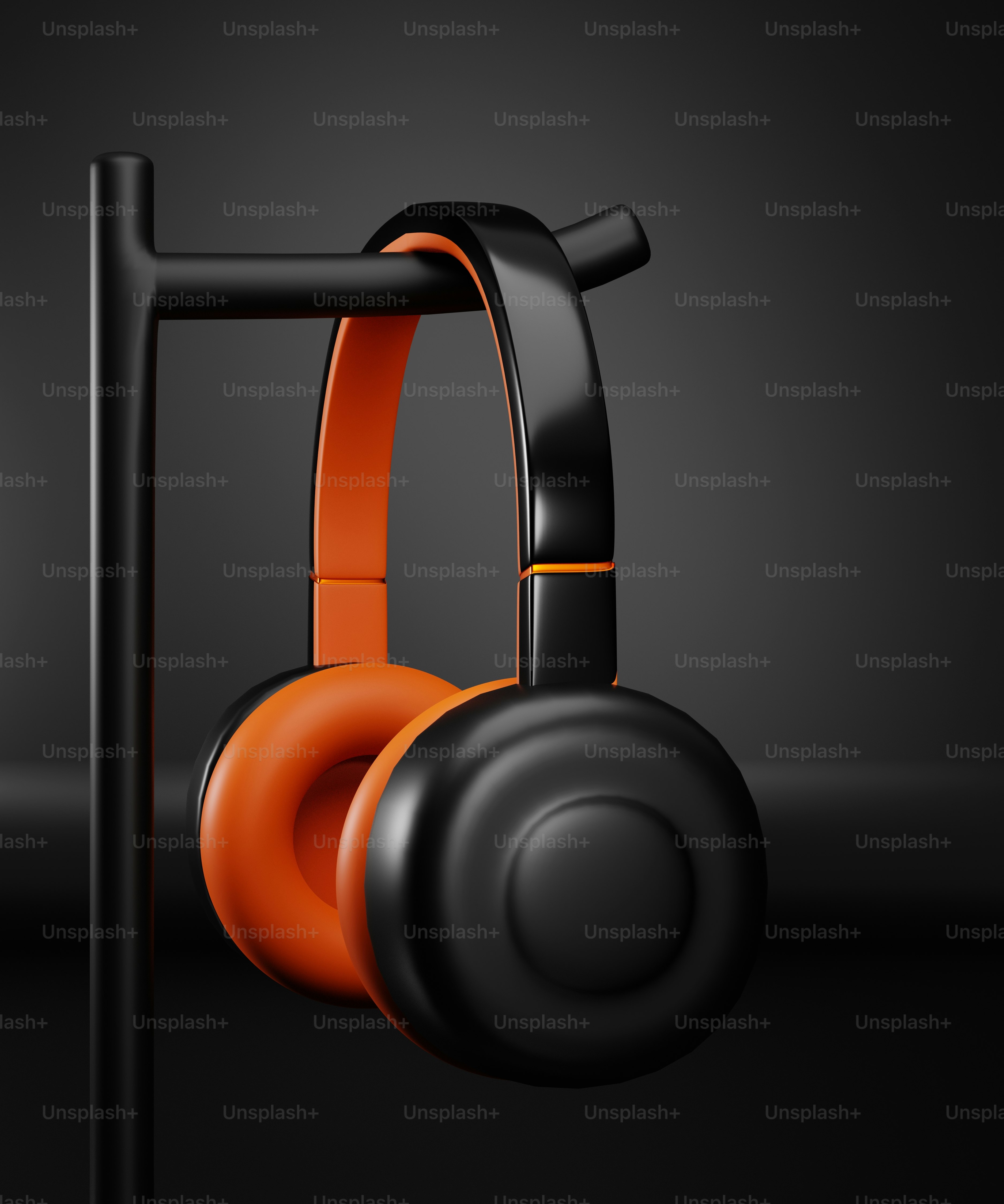 a pair of headphones hanging on a rack