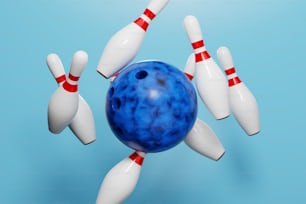 a blue bowling ball crashing into the pins